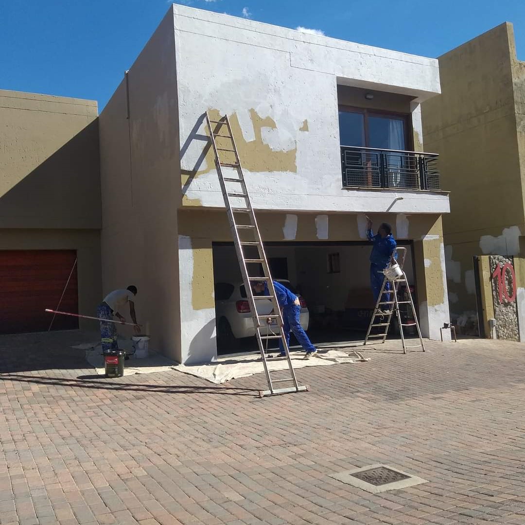 Professional painters at work